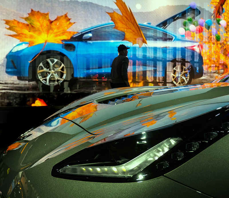 Feature - 2nd place - Leaves appear to fall on the hood of a Corvette Stingray at the 2016 North American International Auto Show in Detroit. (Andy Morrison / The (Toledo) Blade)