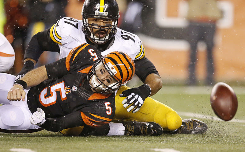 SSports - HM - Cincinnati Bengals quarterback AJ McCarron (5) fumbles the ball in the second quarter of the AFC wild-card game against the Pittsburgh Steelers at Paul Brown Stadium in Cincinnati. (Kareem Elgazzar / Cincinnati Enquirer)