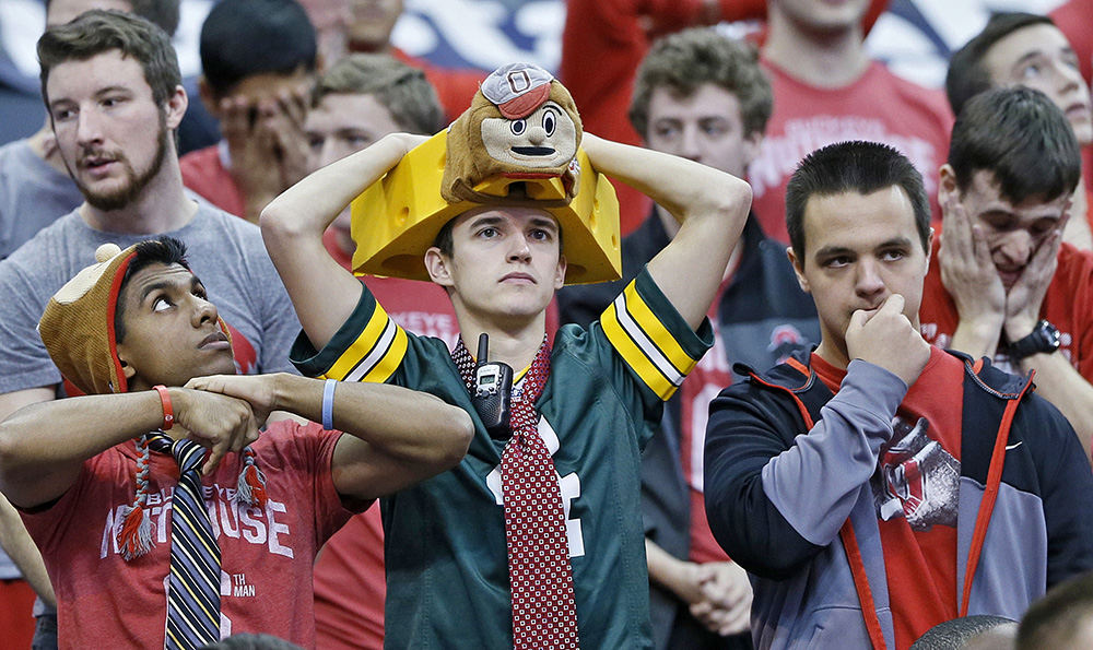 Sports Feature - 1st place - Nervous Buckeye fans watch apprehensively near the end of the team's game against the Northwestern Wildcats at Value City Arena in Columbus. Northwestern won the game 74-72.  (Barbara J. Perenic / The Columbus Dispatch)