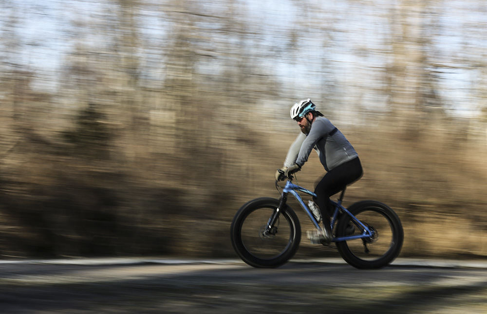    Story - 2nd place - Adam Slough of Waterviile competes in the Fat Bikes Division during an 8 mile time trial race at Providence Metro Park in Grand Rapids, Ohio. This was the first of two races in  the Winter Quest series sponsored by Cycle Werks and Toledo Metroparks. (Jeremy Wadsworth / The Blade)