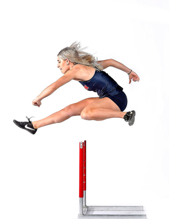 Portrait - 2nd placeCorey Rinella of the  Dayton Flyers track and field team shows off her hurdling form during a recent photo shoot to promote the Flyers' upcoming indoor season. (Erik Schelkun/Elsestar Images)