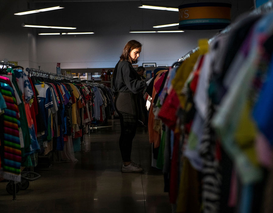 General News - HM - Megan Richardson shops for deals at the North Canton Goodwill. (Aaron Self/The Canton Repository)