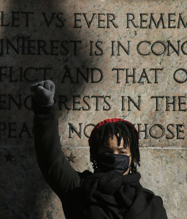 Portrait - 1st place - Amara Rivers holds up her fist in front of the President William McKinley statue at the Ohio Statehouse to protest police brutality. Amara's sister, Marije Rivers, 18, a student at Ohio University, helped organize the event, dubbed the Last Stand Rally.  (Barbara J. Perenic / The Columbus Dispatch)