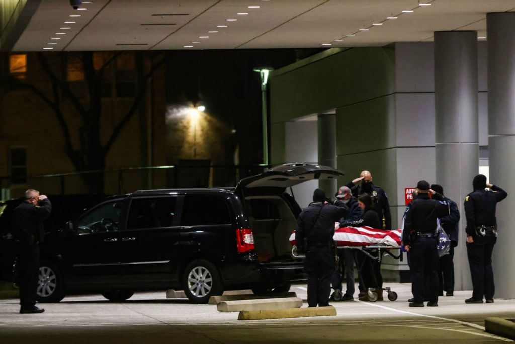 Story - 2nd place - Family of slain Toledo Police Officer Brandon Stalker say their goodbyes before he is taken to the coroners office in Toledo. (Rebecca Benson / The Blade)