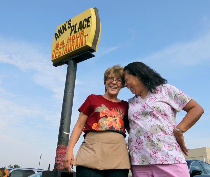 Portrait - 1st placeCynda Williams (right) is initiating a campaign to raise funds for a new sign for her friend Wilma Parsons, the owner of Ann's Place Restaurant. (Phil Masturzo / Akron Beacon Journal)