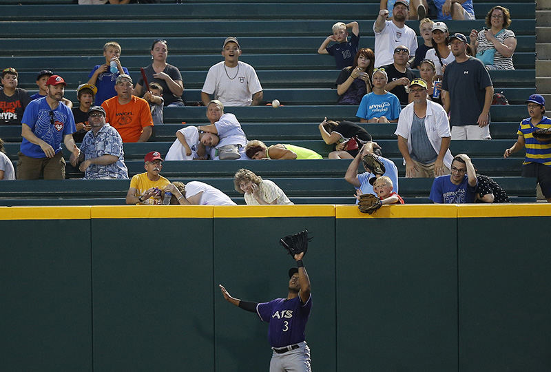 Sports - 2nd place - Fans react as Louisville Bats left fielder Thomas Neal (3) catches an out in the top of fifth inning against the Columbus Clippers at Huntington Park. (Eamon Queeney / The Columbus Dispatch)