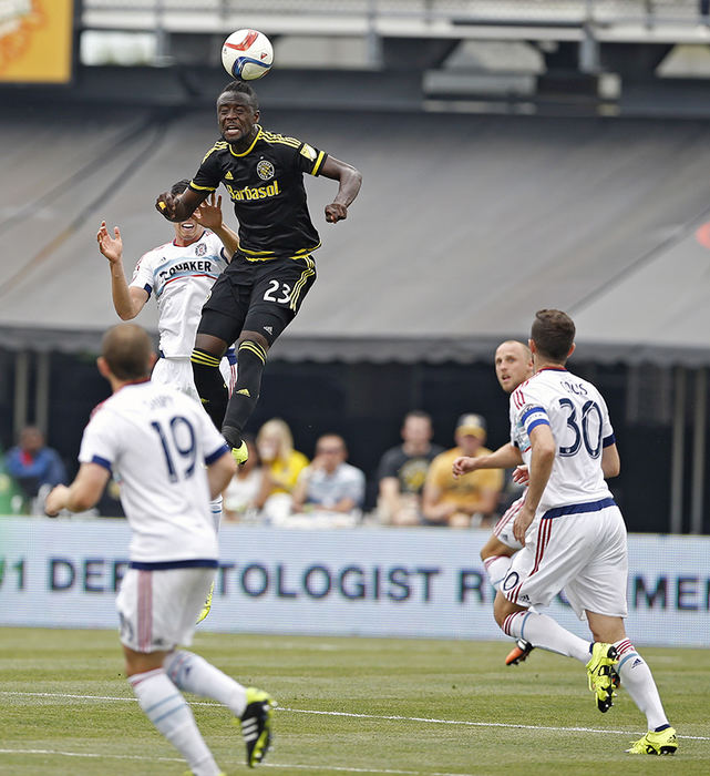 Sports - 3rd place - Columbus Crew forward Kei Kamara (23) connects on a header against Chicago Fire defender Matt Polster (2) during the 1st half of their MLS game against Chicago Fire at Mapfre Stadium in Columbus.   (Kyle Robertson / The Columbus Dispatch)