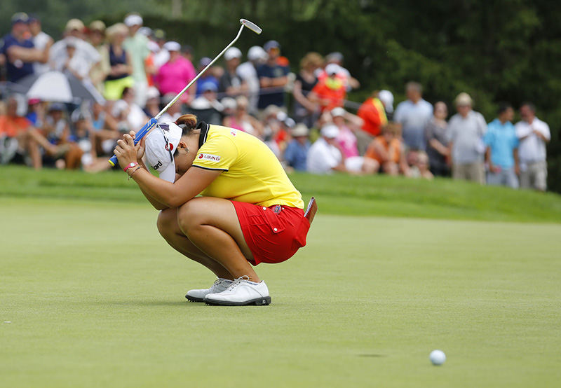 Story - 2nd place - Ha Na Jang reacts after barely missing a birdie putt on the 18th hole that could have won her the LPGA Marathon Classic at Highland Meadows Golf Club. Jang was eventually defeated by Chella Choi in a playoff.  (Andy Morrison / The (Toledo) Blade)