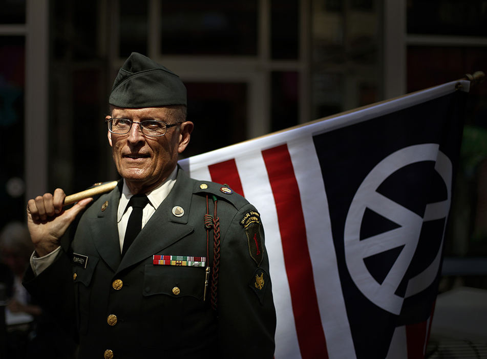 Portrait - 1st place - Lou Pumphrey of Shaker Heights, Cleveland poses for a photo on E. 4th St. on the second day of the Republican National Convention in Cleveland.  Lou was in the Vietnam from 66-68 and was a reporter and editor for the first infantry division newspaper.    (Kyle Robertson / The Columbus Dispatch)