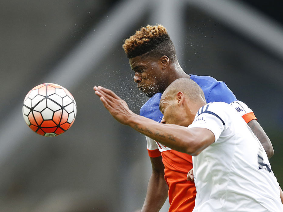 SSports - 2nd place - FC Cincinnati forward Sean Okoli (9) goes up for a challenge in the first half during the USL soccer match between Bethlehem Steel FC and FC Cincinnati, at Nippert Stadium in Cincinnati. (Kareem Elgazzar / Cincinnati Enquirer)