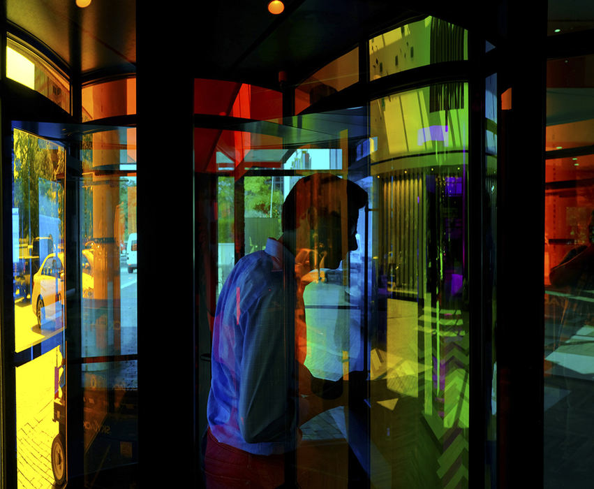    Feature - HM -  A person enters the new Renaissance Hotel through a prism doorway  in Toledo. (Jeremy Wadsworth / The Blade)