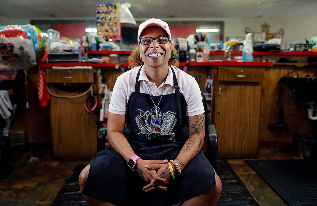 Portrait - HMPisce McCoy "BarbHer" poses for photo at Kutthroat Barber Shop in Columbus.  McCoy has been a barber in Columbus for the last four years.  (Kyle Robertson/The Columbus Dispatch)