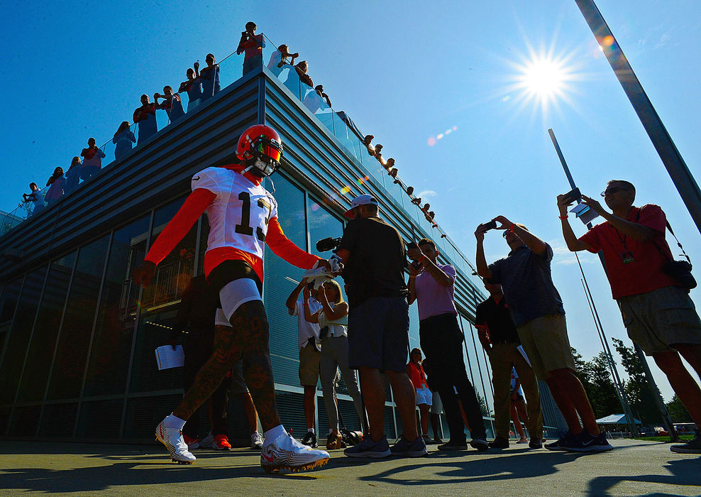 Sports Feature - HMCleveland Browns receiver Odell Beckham Jr. makes his way onto the practice field for first day of Browns training camp in Berea. (Jeff Lange/Akron Beacon Journal)