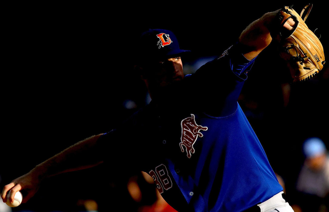 Sports - HMSunlight illuminates one of the eyes of Durham's Aaron Slegers (38) as he pitches during an International League game between the Toledo Mud Hens and Durham Bulls at Fifth Third Field in Toledo. (Kurt Steiss/The Blade)