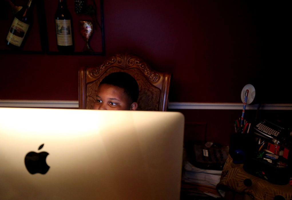 Story - 3rd placeJaden Jefferson edits his news show, Jaden Reports NOW/Eyewitness News, at his home in Toledo. (Kurt Steiss/The Blade)