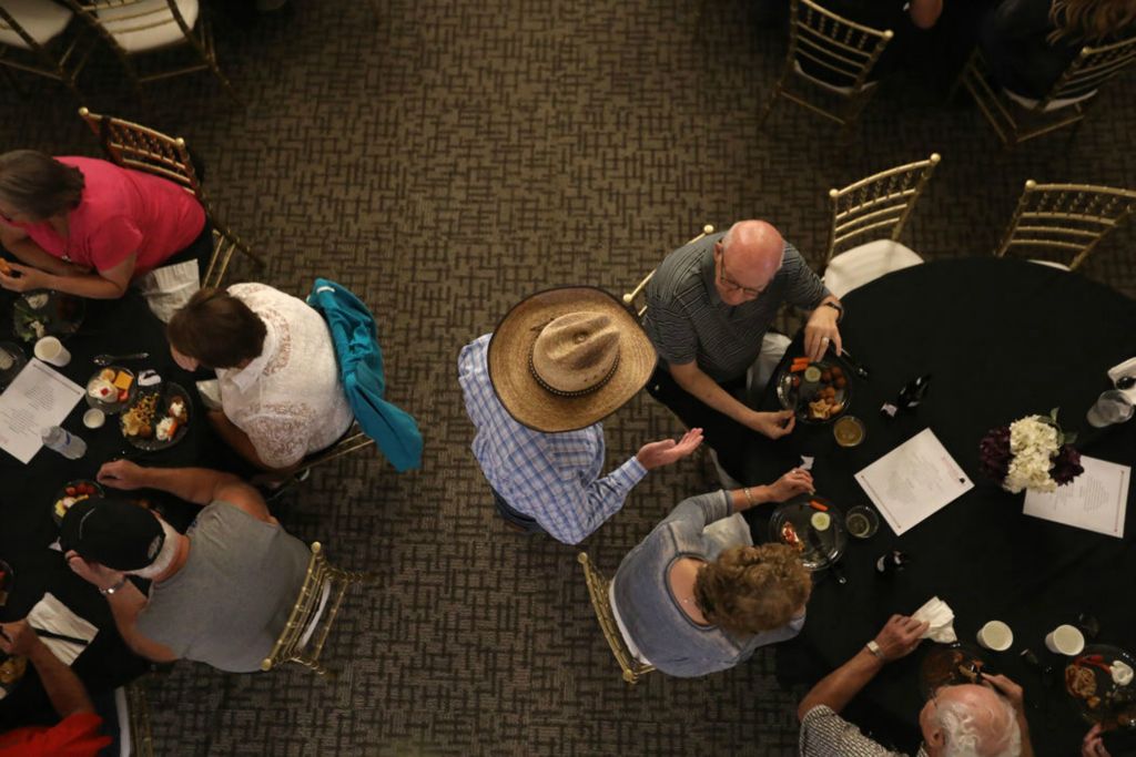 Portrait - 3rd place - Joe Blystone (center) a Republican running for governor, speaks to his supporters during a campaign event at The Chandelier Community Center in Tiffin. (Amy E. Voigt / The Blade)  