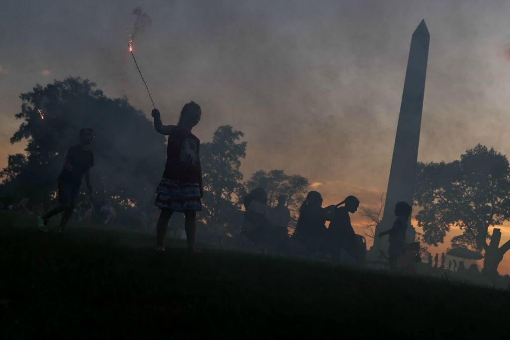 General News - 3rd place - Toledo resident Noah Napier, 8, (left) sprints across a footpath as sister Ayva Napier, 6, twirls her sparkler at a Perrysburg and Maumee joint Fourth of July celebration at Fort Meigs in Perrysburg.  (Isaac Ritchey / The Blade)