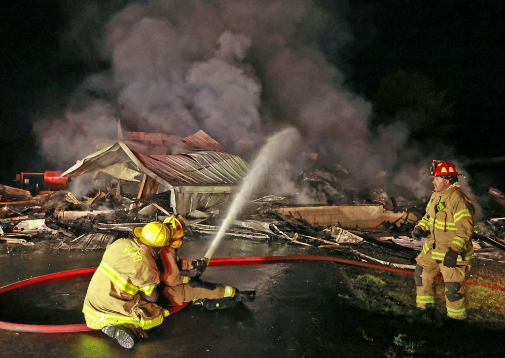 Spot News - 2nd place - Fire departments from Bethel Twp., New Carlisle, German Twp., Moorefield Twp., Springfield Twp. and Bethel Twp. in Miami County responded to a barn fire at 1729 Liberty Road. The barn, which was completely destroyed, was fully engulfed when the first fire departments arrived on the scene. The heat from the flames also damaged the nearby residence.  (Bill Lackey / Springfield News-Sun)