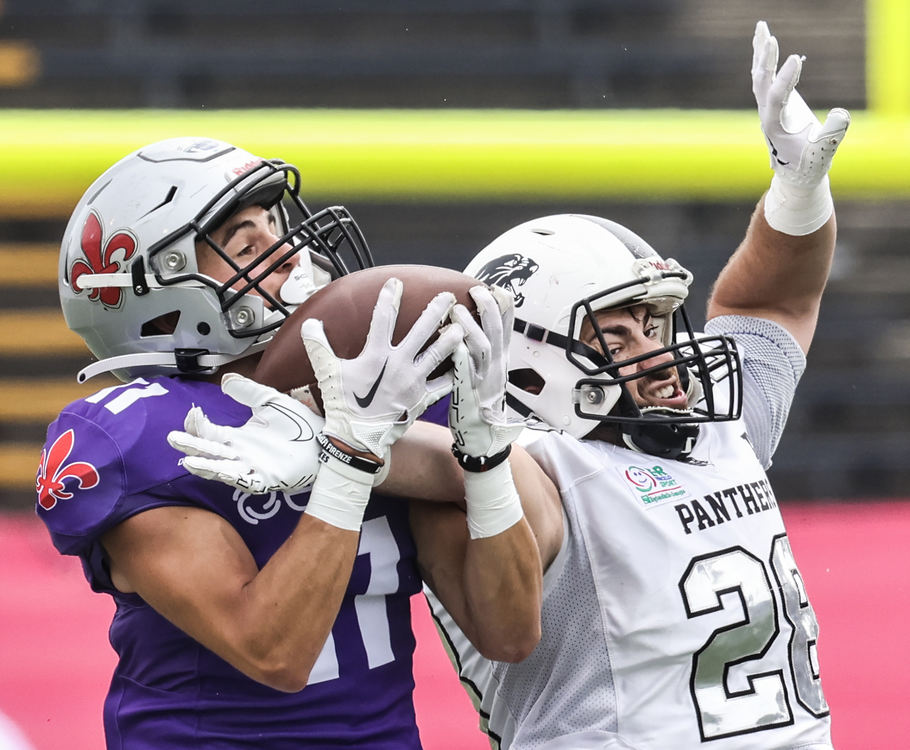 Sports - 2nd place - Parma Panthers linebacker Marcello Leone (28) breaks up a pass intended for Firenze Guelfi wide receiver Niccolo' Formosa (11) during the Italian Bowl XLII at the Glass Bowl in Toledo.  (Jeremy Wadsworth / The Blade)