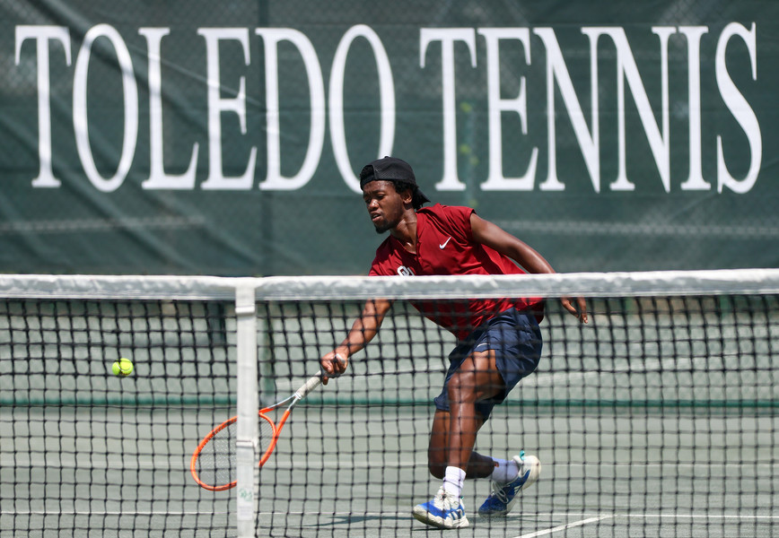 Sports - 3rd place - Siphos Montsi runs to the net for a drop shot during the Ray Simon Open at the Toledo Tennis Club in Ottawa Hills. (Kurt Steiss / The Blade)