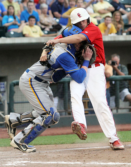 Sports - 3rd placeArchbishop Moeller's Cameron Whitehead tags out Grove City's Brandon Gooch during the Division I state semifinal at Huntington Park in Columbus.  Grove City lost 3-2. (Lorrie Cecil / ThisWeek Newspapers)