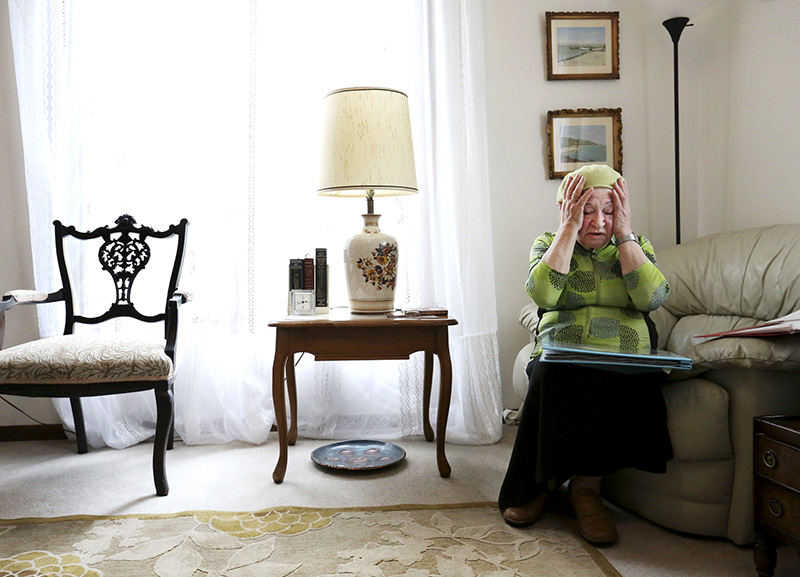 Portrait - 2nd place - Sitting in her Bexley home Holocaust survivor Sofiya Karpovich, recounts an incident that happened when she was 4 years old. Her mother tried to cover Sofiya's eyes so she couldn't see a German soldier toss a baby into the air and another German soldier shooting the airborne baby.  (Fred Squillante / The Columbus Dispatch)