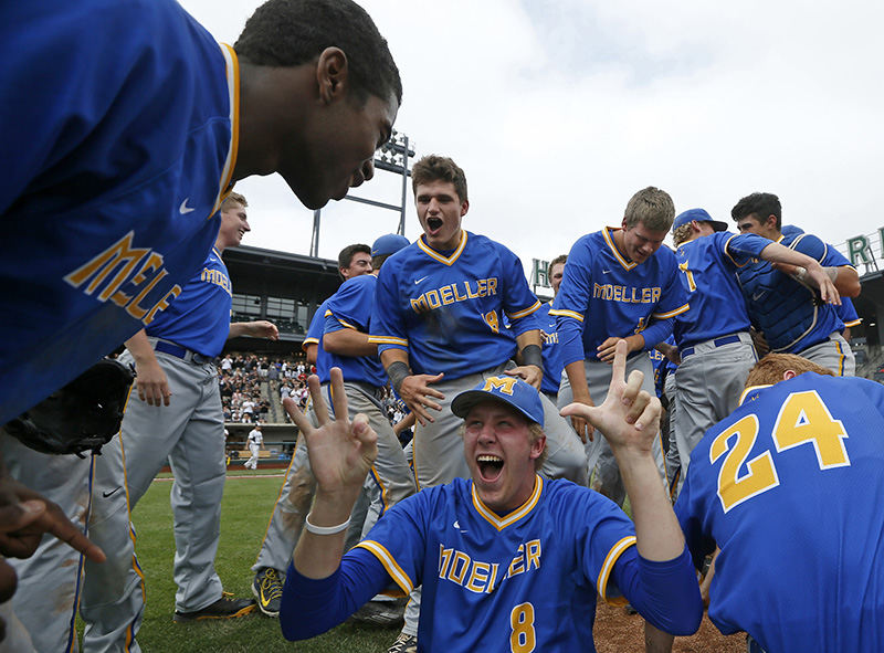 SSports Feature - 3rd place - The Moeller Crusaders celebrates on the mound after their win over Westerville Central in the Division I state championship baseball game at Huntington Park in Columbus.  (Sam Greene / Cincinnati Enquirer)