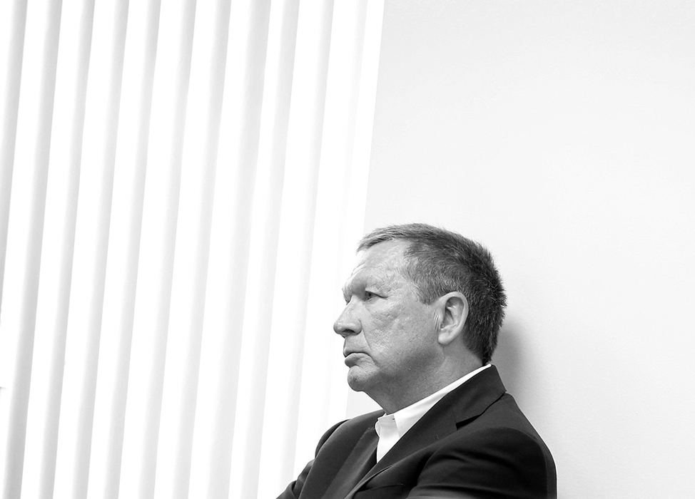 Portrait - 3rd place - Ohio Governor John Kasich waits to speak at a press conference at the Highway Patrol Training Academy in Columbus. (Barbara J. Perenic / The Columbus Dispatch)