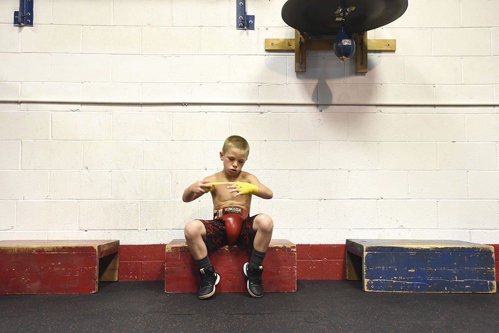 Story - 1st place - Leevi Matthew Wade, 7, gets ready to spar at the Zanesville Police Athletic League. (Chris Crook / Zanesville Times Recorder)