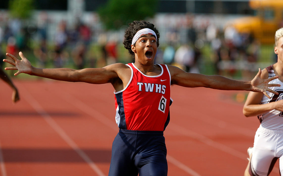 Sports Feature - 1st placeThomas Worthington's Justin Braun reacts as finishes in first place in the Div I, 400-meter dash during the OHSAA state track and field tournament at Jesse Owens Memorial Stadium in Columbus. (Shane Flanigan/ThisWeek Community News)