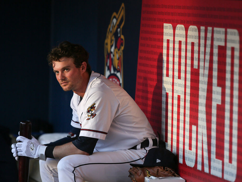 Sports Feature - 3rd placeToledo Mud Hens DH Danny Woodrow sits in the dugout during a game against the Indianapolis Indians at Fifth Third Field in Toledo. (Jeremy Wadsworth/The Blade)