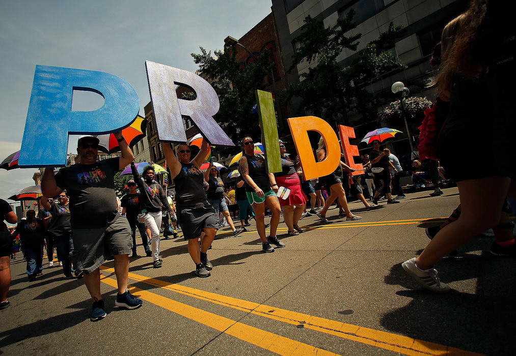 Story - 3rd placeMore than half-million attendees descending on Downtown and the Short North for the annual Stonewall Columbus Pride parade. The parade has grown to one of the largest in the Midwest. (Kyle Robertson/The Columbus Dispatch)