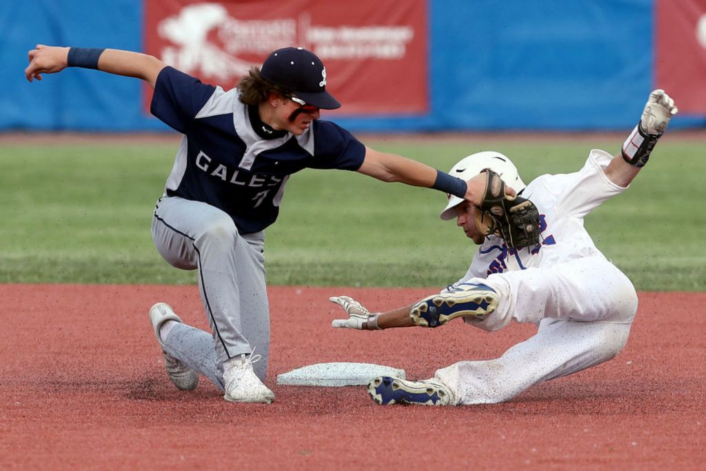 Sports - 3rd place - Lancaster's Tony Falvo tags out Grove City's Grady Speegle at second base during a Division I district final at Grove City High School. (Shane Flanigan / ThisWeek Community News)