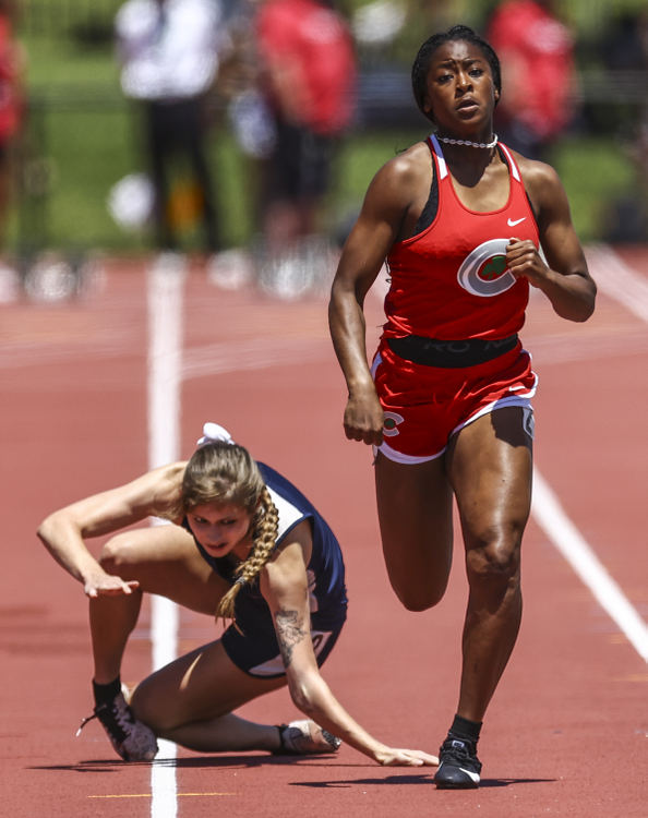 Sports - 2nd place - Central Catholic’s Nyla King (right) finishes fourth in the Division II 200 meter dash as Josie Knierim of Morgan falls and breaks her elbow during the OHSAA State Track & Field Meet at Jessie Owens Memorial Stadium in Columbus. (Jeremy Wadsworth / The Blade)