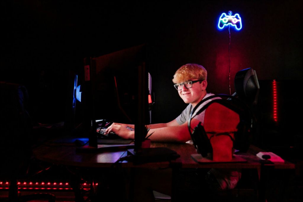 Portrait - 1st place - Hayden Freeland, a junior at Indian Valley High School in Gnadenhutten, is an avid gamer who maintains three separate gaming stations in a dedicated room at his home in Rush Township, where he lives with his parents, Steve and Jennifer. The home is situated in a rural area previously devoid of stable internet connectivity, until Spectrum began offering broadband not long ago. Since almost all of Hayden's school work is done through a Chromebook, the recent improvement has also vastly improved his schooling experience. (Andrew Dolph / The Times Reporter)