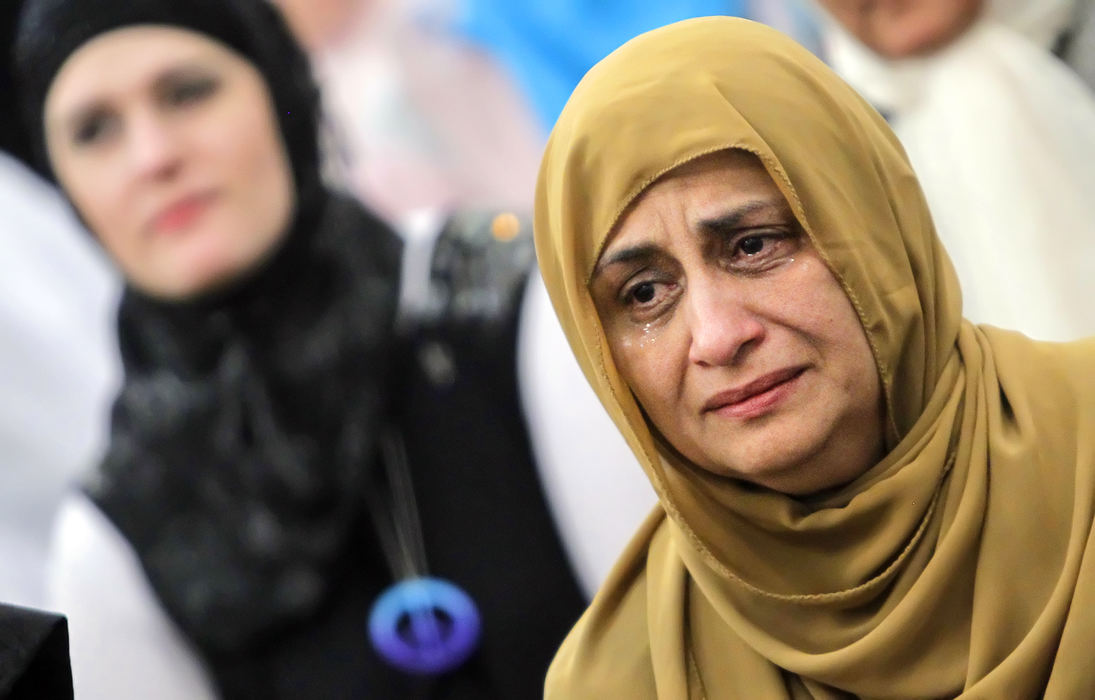 General News - HMTears of joy well up in the eyes of Dr. Samina Hasan, Waterville, during Friday prayer services at the Islamic Center of Greater Toledo. Friday's services were an emotional return to the mosque since an arson attack last September.  (Andy Morrison / The (Toledo) Blade)