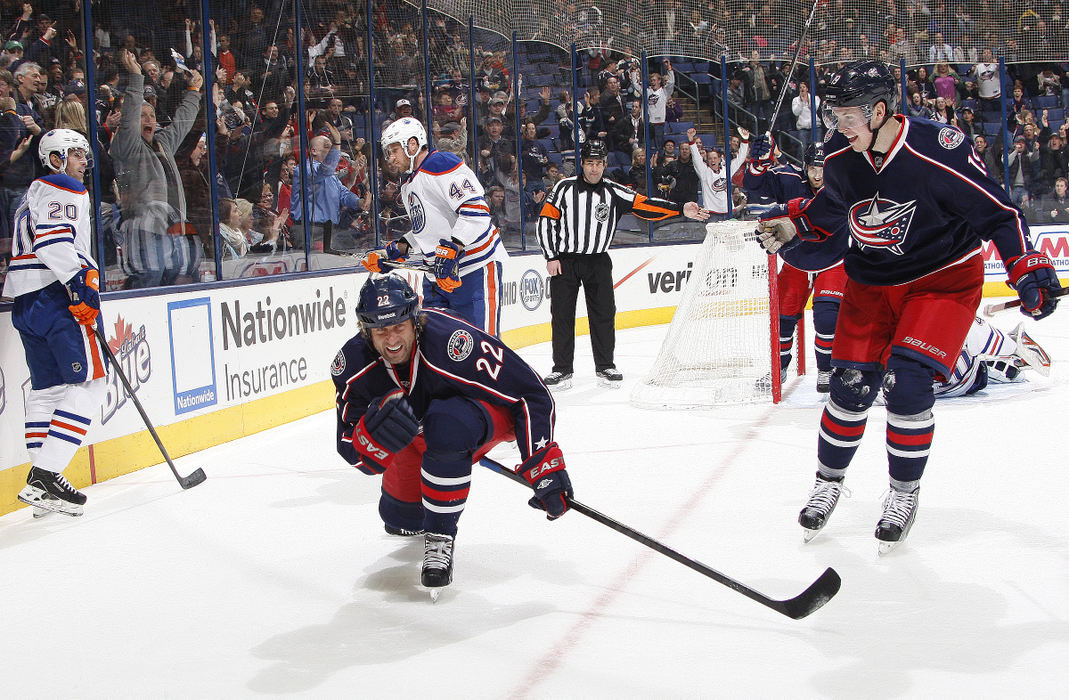 Sports Feature - HMColumbus Blue Jackets center Vinny Prospal (22) and center Ryan Johansen (19) celebrate Prospal's goal during the first period of the NHL hockey game against the Edmonton Oilers at Nationwide Arena in Columbus.  (Adam Cairns / The Columbus Dispatch)