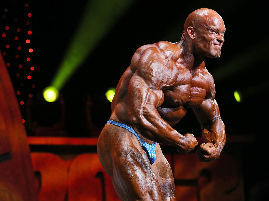 Sports - 2nd placeBen Pakulski flexes everything from head to toe during the 2013 Arnold Classic at Veterans Memorial Coliseum in Columbus on March 2. Pakulski was given the Most Muscular Award, but finished runner-up to Dexter Jackson for the overall title.  (Adam Cairns / The Columbus Dispatch)