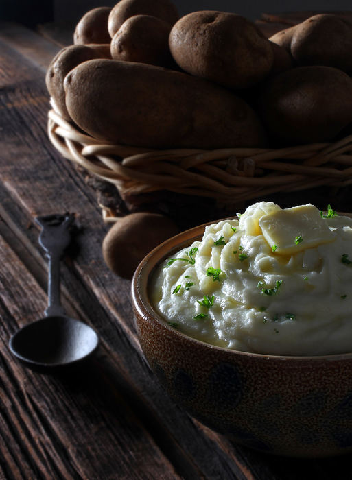 Illustration - 1st place - Mash potatoes, a good comfort food. (Phil Masturzo / Akron Beacon Journal)