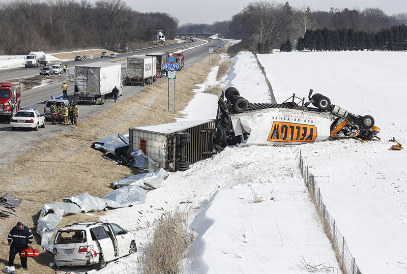 Spot News - 2nd place - A helicopter lifts off from the scene of an accident on the eastbound lanes of the Ohio Turnpike just east of Swanton near Scott Road.   (Andy Morrison / The (Toledo) Blade)