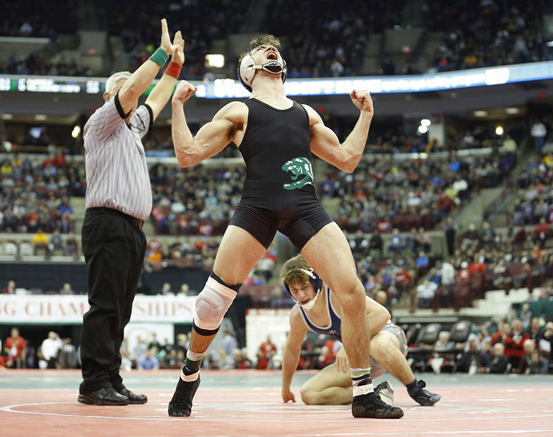 Sports Feature - 1st place - Delta High School's Dustin Marteney celebrates after defeating Brendan Fitzgerald of Grandview Heights during their 138-pound Division III championship final match at the state wrestling individual tournament in Columbus. (Andy Morrison / The (Toledo) Blade)