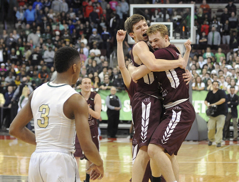 Story - 2nd place - John Glenn's Austin Blatt and Matt Weir celebrate after the Muskies defeated Akron St. Vincent-St. Mary, 76-72, to claim the Division II state championship. (Shane Flanigan / Zanesville Times Recorder)