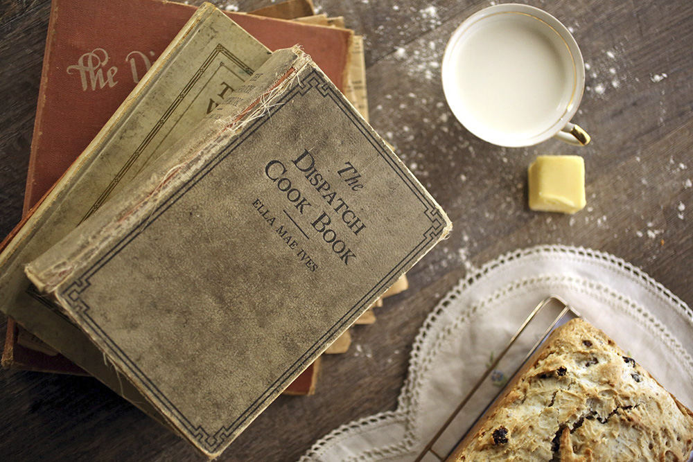 Illustration - 3rd place - Vintage Columbus Dispatch cookbooks paired with a walnut of butter, a teacup of cream and Raisin Nut Bread.   (Brooke LaValley / The Columbus Dispatch)