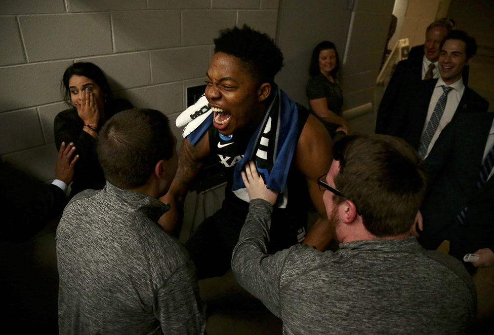 SSports Feature - 3rd place - Xavier Musketeers forward Tyrique Jones (0) screams in celebration as he enters the locker room after the NCAA tournament second round game against the Florida State Seminoles at the Amway Center in Orlando, Fla. The 11-seeded Musketeers controlled both halves of the game, defeating the Seminoles, 91-66, advancing to the Sweet 16. (Sam Greene / Cincinnati Enquirer)