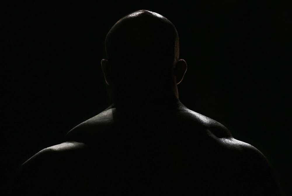 Story - 1st place - Arnold Classic competitor Juan Morel waits to enter the stage before the Arnold Classic  in Columbus.  Juan is one of the only classic competitors that brings his family with him for a show.   (Kyle Robertson / The Columbus Dispatch)