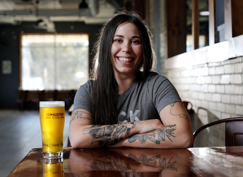 Portrait - 2nd place - Madeline Douglas helped brew the Lady Peiskos beer for Combustion Brewery & Taproom in Pickerington where she posed for a portrait. (Fred Squillante / The Columbus Dispatch)