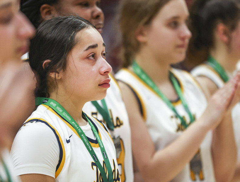 Sports Feature - 3rd place - A tear falls down Toledo Christian’s Jordan Rosales after falling to New Madison Tri-Village’s in the Division IV high school basketball final at the University of Dayton Arena. Toledo Christian fell to New Madison, 52-50.  (Rebecca Benson / The Blade)