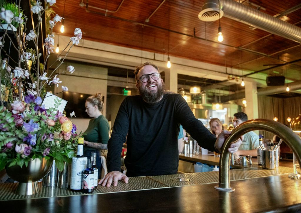 Portrait - HM - Will Hollingsworth, owner, behind the bar of Good Company. (Lisa Scalfaro / Akron Beacon Journal)