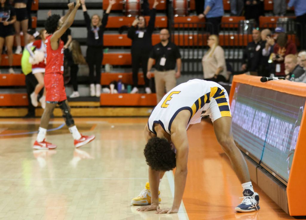 Sports Feature - HM - Toledo Christian’s Conye Gaston reacts as he misses the game-tying buzzer beater attempt at the end of a Division IV regional final basketball game against Lima Central Catholic at Bowling Green State University’s Stroh Center. (Kurt Steiss / The Blade)