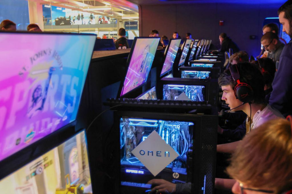 Story - 3rd place - St. John’s Jesuit’s  Overwatch team competes during the Northwest Ohio Esports Regionals at the Cedar Point Sports Center in Sandusky.  (Jonathan Aguilar / The Blade)